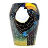 A Dennis China Works vase decorated with tubelined toucans to a design by Sally Tuffin,