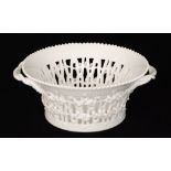 A Royal Copenhagen blanc de chine basket with pierced panel sections to the wall and decorated with