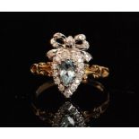 A 9ct hallmarked blue topaz and diamond cluster ring,