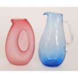 A contemporary studio glass jug by Samantha Sweet of compressed ovoid form with integral handle in