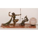 An Art Deco painted spelter figural table lamp, Diana the Huntress in pursuit of a deer,