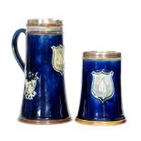 A Royal Doulton Lambeth commemorative trophy jug and tumbler of tapered cylindrical form,