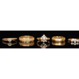 Five assorted 18ct rings to include a paste set full eternity,