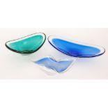 A 20th Century Magnor bowl of elliptical form the blue ground cased in clear crystal with a similar