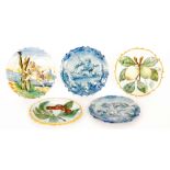 Five assorted Cantagalli dishes comprising two decorated in blue and white with cherubs within