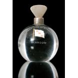 An early 20th Century spherical glass paperweight with an applied white metal handle,