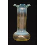 A late 19th to early 20th Century glass vase in the manner of James Powell & Sons with compressed