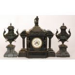 A 19th Century matched black slate clock garniture,