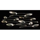 A parcel lot of assorted silver and white metal flatware to include tea spoons, forks,