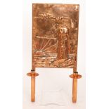 A modern reproduction copper candle wall bracket,