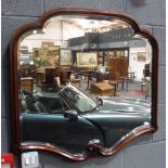 A 19th Century mahogany framed wall mirror of cartouche form,