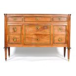 A 19th Century French Empire style commode chest with gilt metal mounts and panelled sides on
