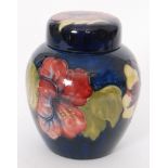 A Moorcroft ginger jar and cover decorated in the Hibiscus pattern with tonal flowers against a