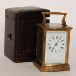 A 19th Century French brass carriage clock, white enamelled dial in leather case,