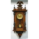 A late 19th to early 20th Century walnut Vienna style wall clock, spring driven movement,