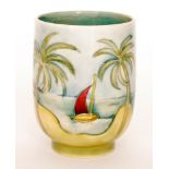 A Moorcroft Pottery footed vase decorated in the Caribbean pattern designed by Walter Moorcroft,