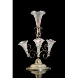 An early 20th Century John Walsh Walsh table epergne with three trumpets flanking the larger