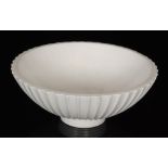 A large Norman Wilson for Wedgwood footed bowl of flared form with ribbed fluting to the exterior