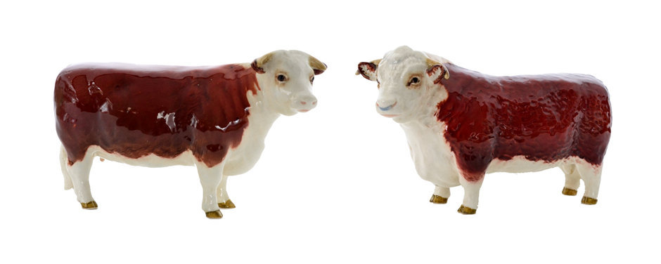 A Beswick Hereford Bull model 1363A and a Hereford Cow model 1360, both Ch of Champions,
