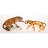 A Beswick Tigress model 1486 together with a Puma on Rock model 1823,