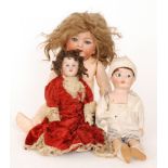 A Heubach and Kopplesdorf bisque head doll with open close eyes and open mouth marked 342.