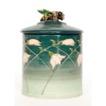 A Dennis China Works lidded box decorated in the Blue Snowdrop and Bee pattern designed by Sally
