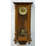 A late 19th Century Vienna regulator walnut cased wall clock,