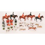 A collection of Britains Hunting Series lead figures to include five huntsmen and huntswomen on