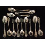 Two sets of six hallmarked silver teaspoons, one fiddle and shell pattern,