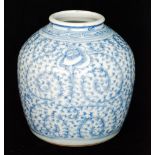 A late 19th to early 20th Century Chinese jar decorated with foliate scrolls and flower heads,