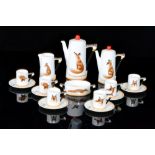 A Royal Doulton coffee set decorated in the Reynard The Fox pattern,