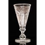 A large post war Tudor Crystal cut glass vase of footed conical form with baluster stem,