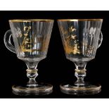 A pair of early 20th Century Baccarat crystal glass punch cups with spread foot to a lapidary knop