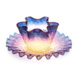 A late 19th Century Thomas Webb & Sons Alexandrite figure bowl of circular form with a wave rim and