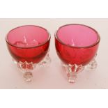 A pair of late 19th Century Stourbridge ruby glass miniature table salts of circular form with