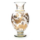 A large late 19th Century continental clear crystal glass vase of baluster form with flared collar