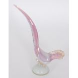 A 20th Century Sommerso glass bird in the manner of Seguso the body in a pale magenta to