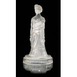 A John Derbyshire pressed glass figure of a young Victoria Circa 1874 in a ceremonial grown holding