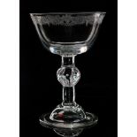 An 18th Century Champagne glass circa 1730, shallow round funnel bowl with everted rim,