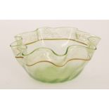 A late 19th Century Stourbridge glass finger bowl of circular form with wave edge,