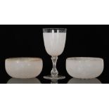 A pair of 19th Century clear crystal glass finger bowls of plain circular section decorated with a