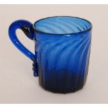 A late 18th Century Bristol blue punch cup circa 1780 of cylindrical form with pronounced wrythen