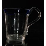 A small 18th Century clear crystal glass mug circa 1750 of plain cylindrical form with an applied