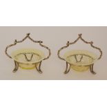 A pair of late 19th Century straw opalescent table salts of circular form with flat rim and wrythen