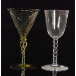 A late 19th Century James Powell & Sons wine glass attributed to Phillip Webb with a wrythen fluted