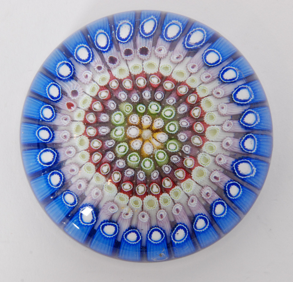 An early 20th Century Arculus paperweight with a concentric millefiori canopy in tonal red, blue,