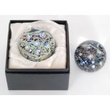 A limited edition Caithness paperweight titled Glassmaker decorated with themed millefiori canes