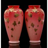 A pair of late 19th Century Harrach Peachblow vases of footed,