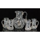 A late 19th Century Stourbridge glass water set comprising an ovoid jug with collar neck and