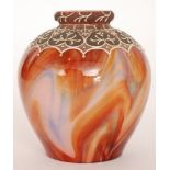 A late 19th Century Loetz Carneol glass vase of ovoid form to the rolled neck the marbled with